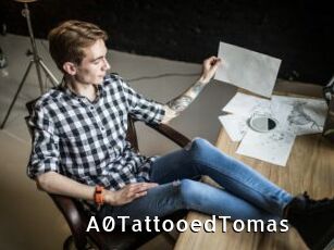 A0TattooedTomas