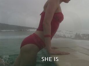 SHE_IS